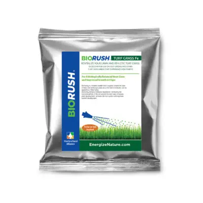 Applying BioRush Turfgrass Fe as a foliar spray on turf to enhance chlorophyll, root activity, and soil vitality with iron and beneficial microbes.