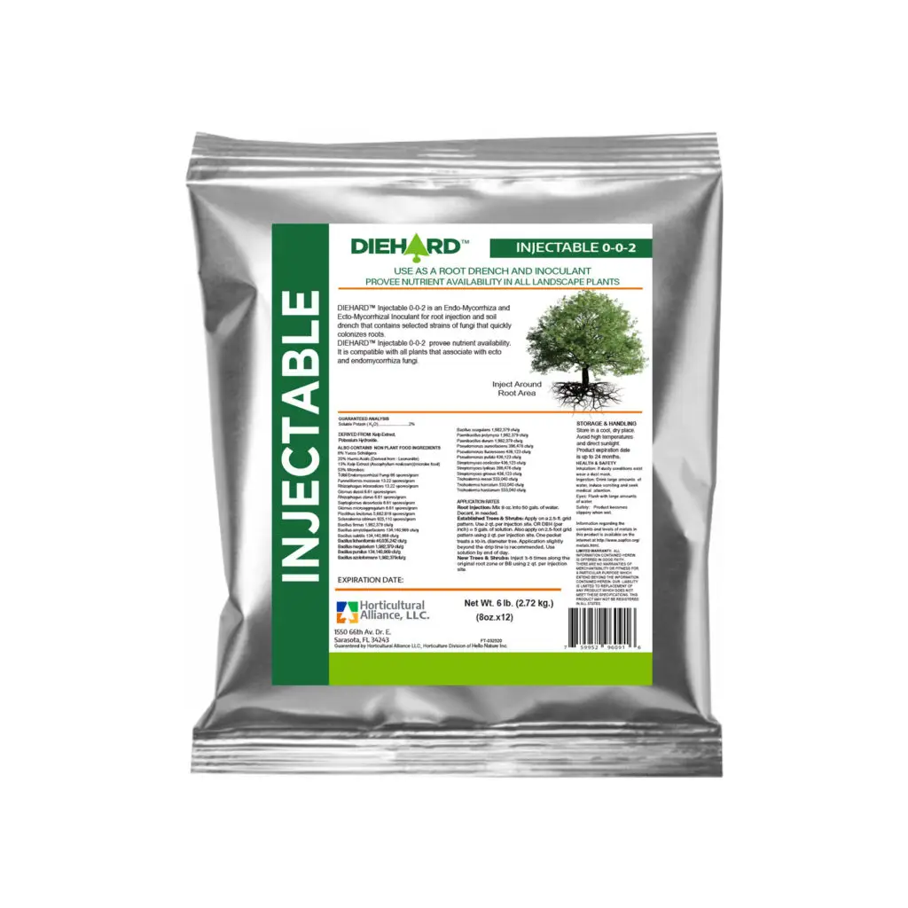 Tree root injection with DIEHARD Ecto Injectable inoculant, enhancing survival, root growth, and stress tolerance in ectomycorrhizal tree species.