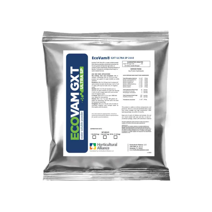 EcoVam GXT Ultra SP water-soluble powder being mixed for nursery application to enhance plant health with beneficial bacteria, fungi, and protein hydrolysate.